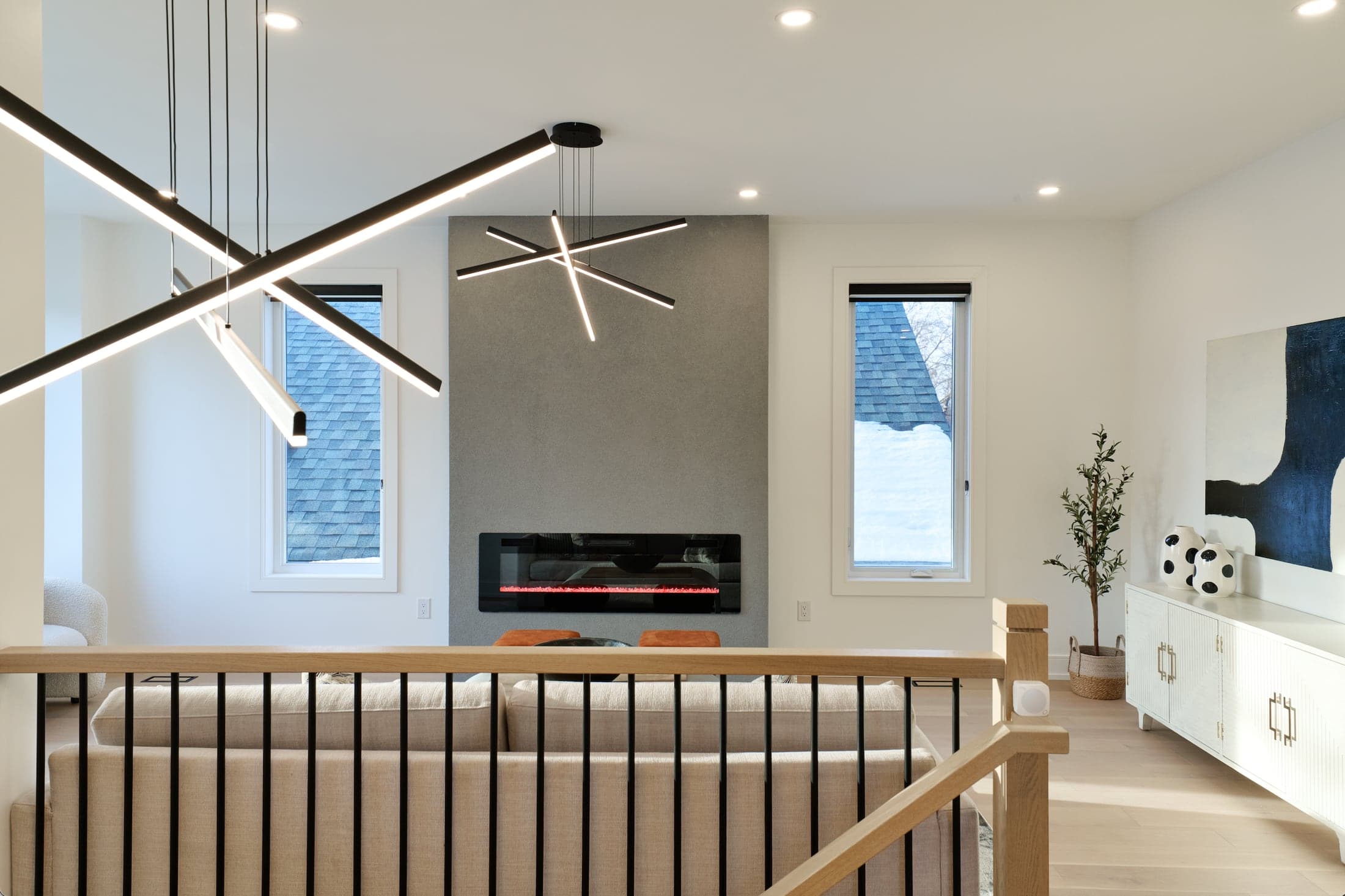 Custom living space with architectural lighting by Vantho Group